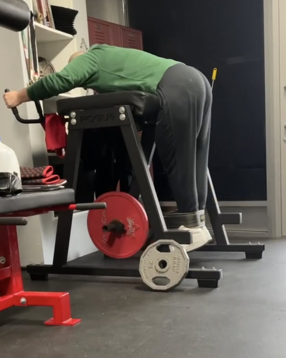 Client using the reverse hyper to decompress the lower back