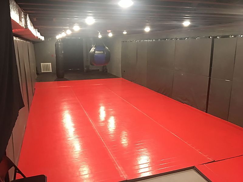 Lower level with red mats and heavy bags