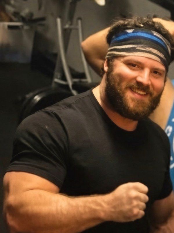 Patrick Rice smiling in the gym
