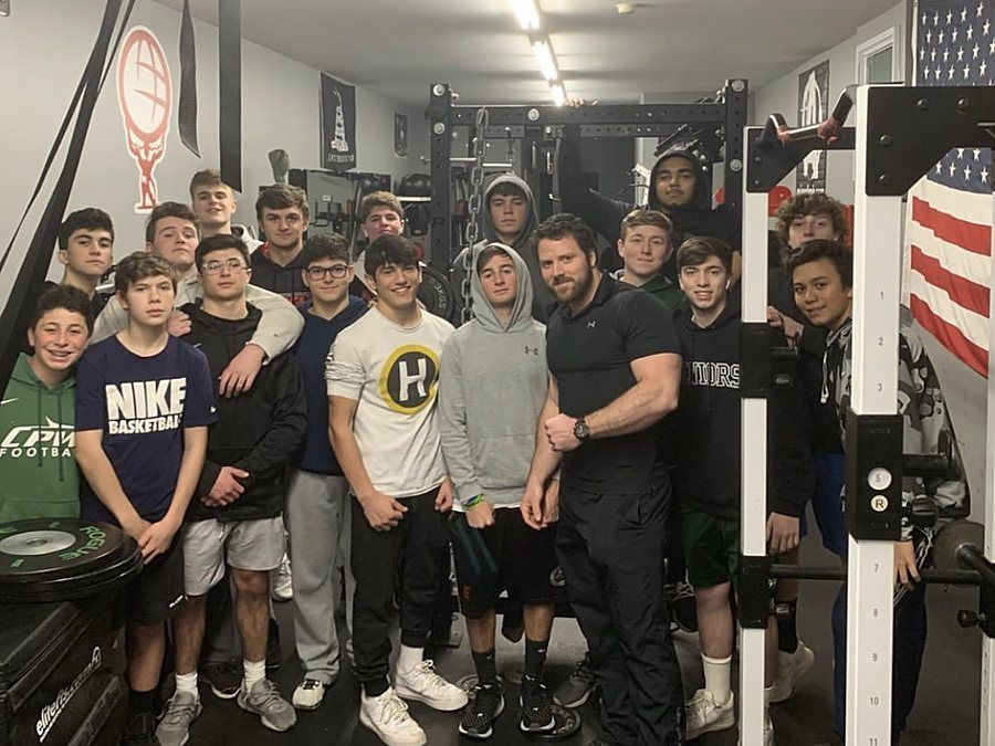 Patrick Rice with a high school team at Atlas Strength